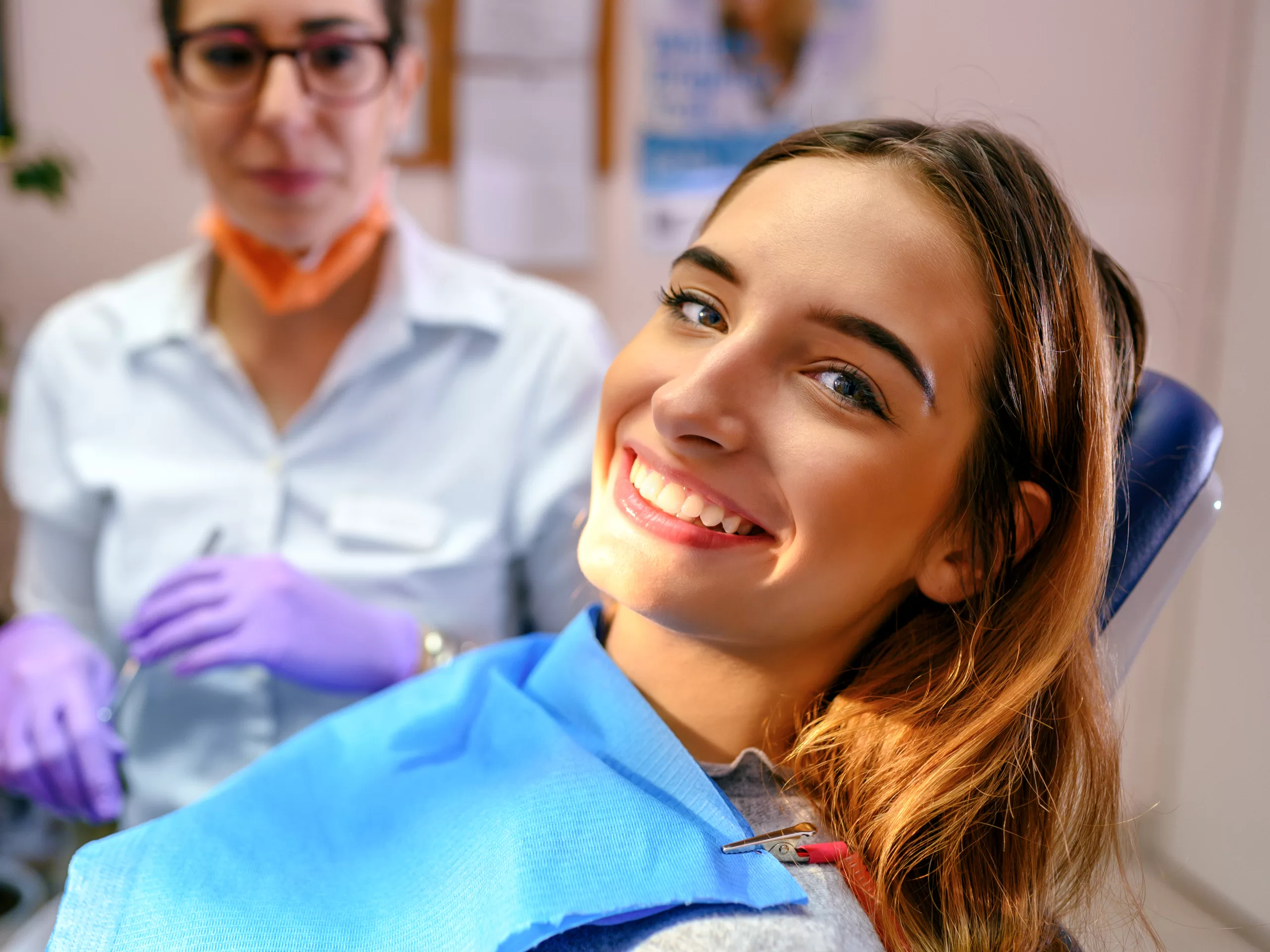 Satisfied patient in the dentists office
